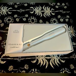 Brand new T3 Lucea 1.5 inch rapid heat styling and straightening iron.